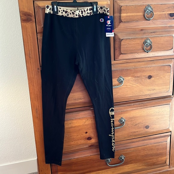 Champion Pants - NWT Champion Women’s black leggings with leopard waist band and lettering.